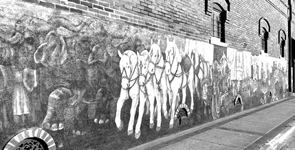 Part of the mural project in Terrell, Texas and is painted on the side of the historic brin opera house